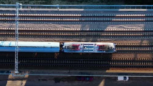 Aerial View of Transparent Train on Tracks