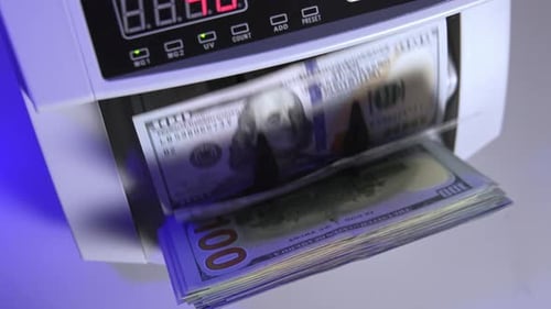 Electronic operations for counting paper money. Cash money counting machine.