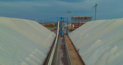 View of a Salt Flat Factory Besides the Sea Raw Materials in Large Volumes are Ready for Export