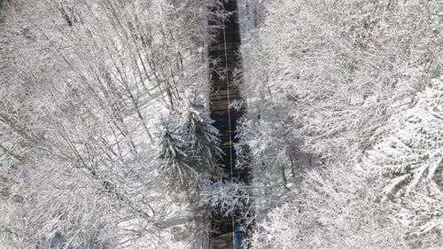 Car passing on the winter mountain road. Beautiful winter landscape with mountain road