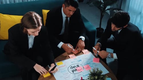 Team Brainstorming Business Ideas in a Modern Office