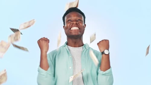 Man Celebrates Winning with Falling Money