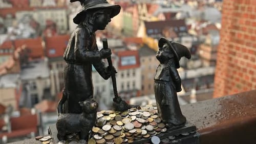 Famous Sculpture with Coins in Wroclaw Poland