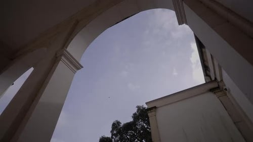 Arched Building Exterior and Bright Sky, Architectural Design