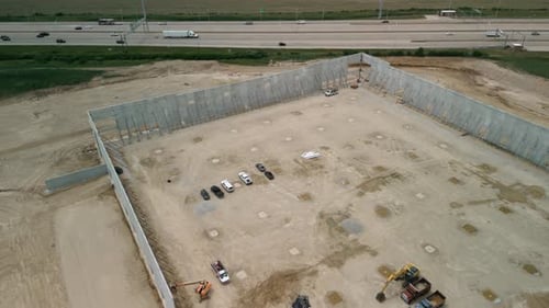 Construction of Warehouse Industrial Building on Light Gauge Framing Wide Drone Shot Footage