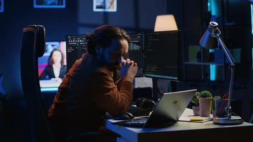 Developer Typing Code in Home Office to Develop Software Application