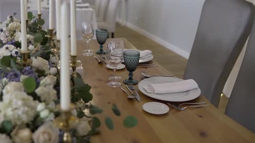 Elegant Table Setting with Flowers and Candles