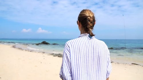 Woman Walking on Beach Super 240