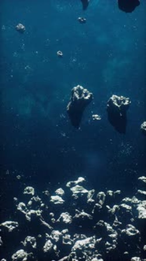 Abstract Space Rocks Floating Upwards in Deep Blue Cosmos