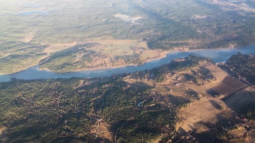 view from an airplane flying above a river