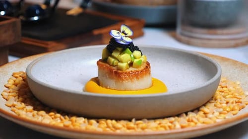 Gourmet Food Presentation with Caviar and Pansy