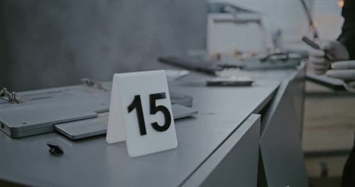 Forensic Investigator Dusting Knife for Evidence