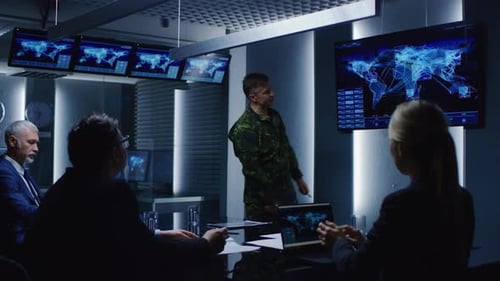 High-Ranking Military Man holds a Briefing to a Team of Government Agents and Politicians, Shows Sa