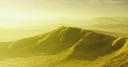 Majestic Golden Hills Under a Bright Sky Create a Stunning Landscape View