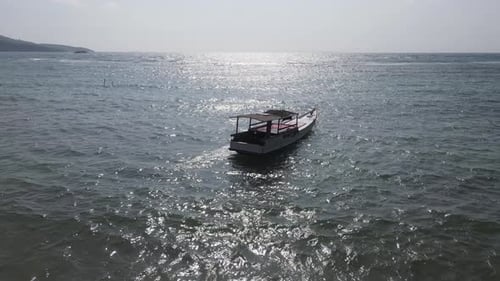 Top view or aerial view of beautiful clear water and white beach with long tail boats on summer trop
