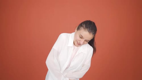 Woman experiencing stomachache.