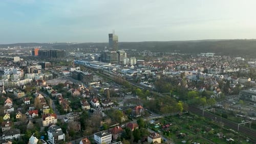 Aerial establishing shot of Gdansk Cityscape in Poland during golden sunrise. Olivia Business Centre