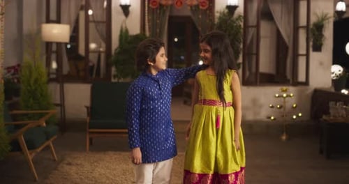 Two Happy Children Posing Together Indoors at Home