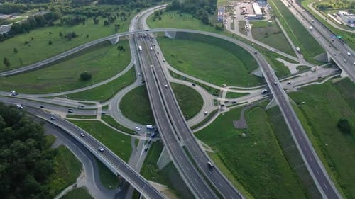 Cars Moving on Transport Road Junction in City Aerial View