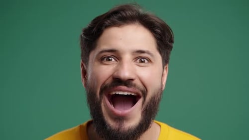 Handsome Amazed Man Reacts With Wow Expression Open Mouth On Green Discovery Surprise Success Great