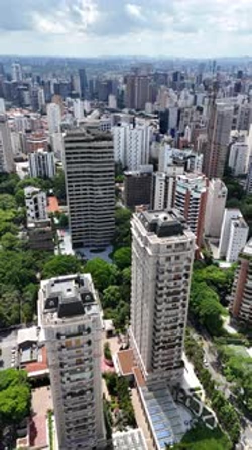 Aerial video above Parque Ibirapuera Sao Paulo on a sunny day