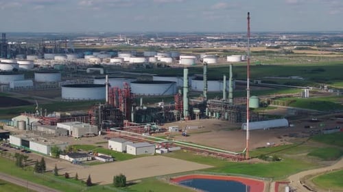 Aerial View of Large Industrial Facility with Storage Tanks