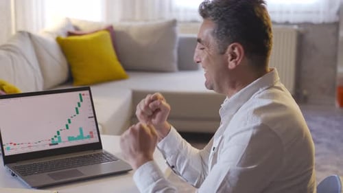 Winning in the stock market. Trader following the stock market.