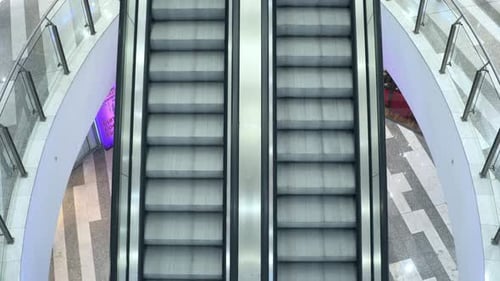 Texture escalator in the shopping center. Movement of the escalator stairs up and down