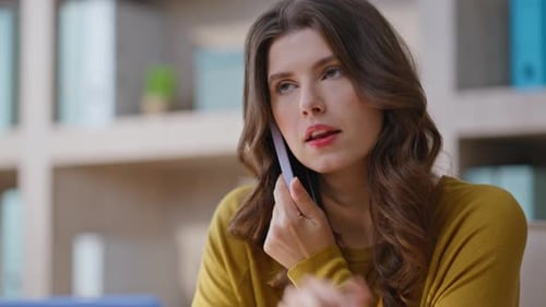 Nervous Businesswoman Talking Smartphone Complaining on Work at Office Closeup