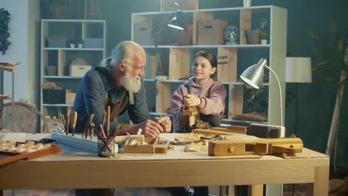 Caring Grandfather with His Teenage Granddaughter Spend Time Together Hobby