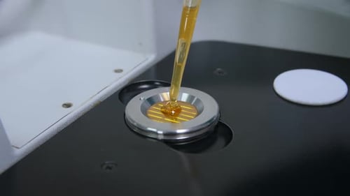 Clear Yellow Liquid Added From Pipette Close Up