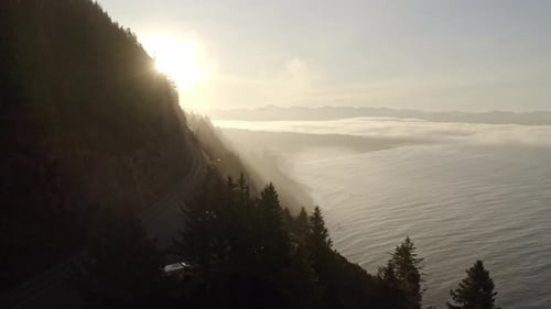 Sunrise on a mountain with the sea below