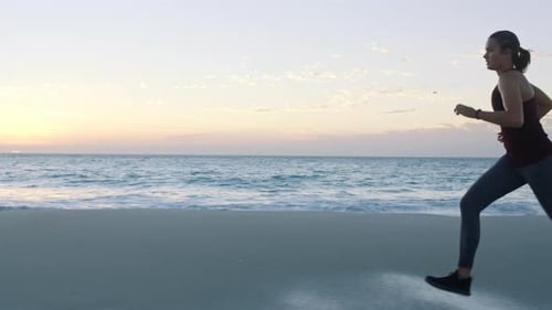Running, runner and woman on beach for fitness, speed and energy with workout outdoor by the ocean