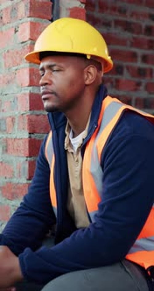Engineer, thinking or black man at construction site with PPE, problem solving