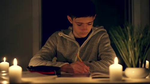 Teen Studies by Candlelight Late at Night
