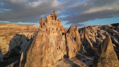 Goreme Town With Spectacular Landscape During Sunset In Cappadocia, Turkey. Aerial Drone Shot