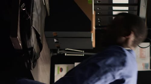 Vertical Video Detective with Bag Arrives in Office