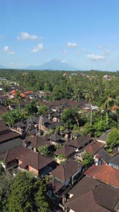 Aerial View of Ubud Rooftops with Jungle and Volcano in Bali Indonesia
