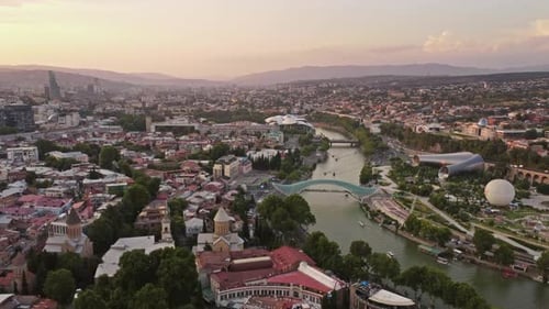 Tbilisi City and Kura River at Sunset