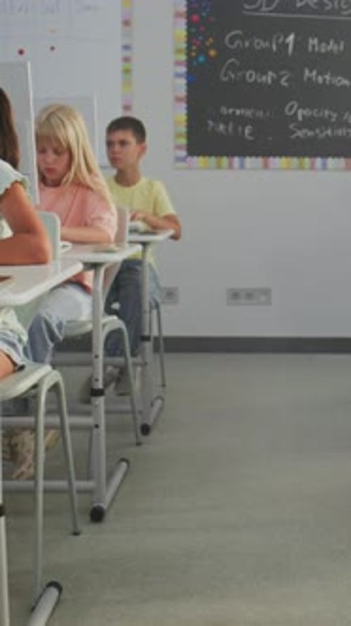 Elementary School Children Using Computers Doing Creative 3D Design Projects