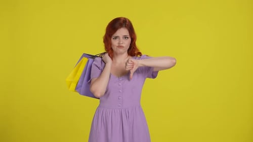 Woman Gives Thumbs Down to Shopping Bags