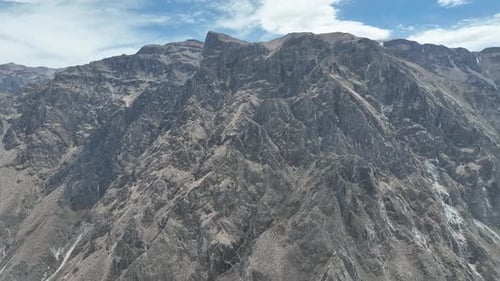 Aerial drone shot of a mountain landscape in peru in a beautiful panoramic view on a sunny day