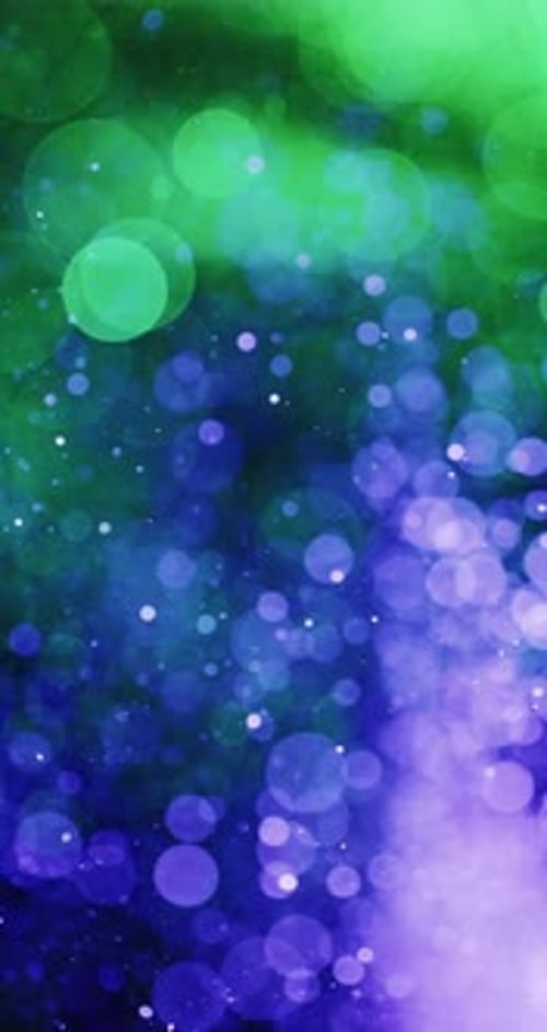 Green And Blue Specks Drifting Together