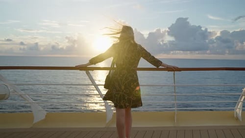 Woman on Cruise Ship Enjoying Ocean Sunrise