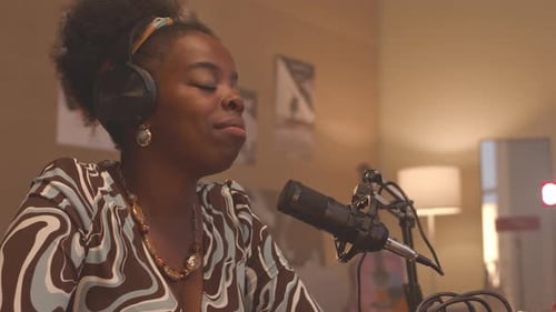 Black Woman Speaking in Mic at Broadcasting Studio