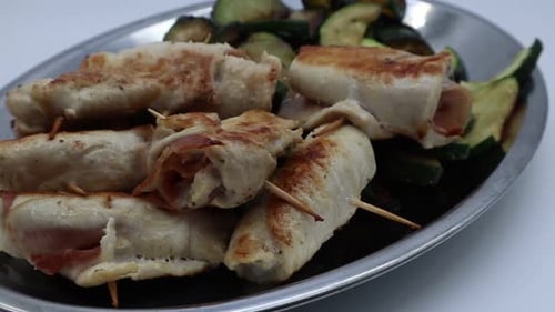 Broiled Skewers with Zucchini on Plate