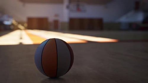 Basketball on Ground in Empty Gym
