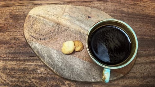Coffee and Cookies Overhead on Wood