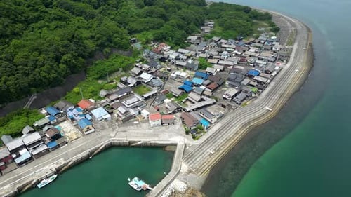 Typical Japanese port town with on small rural island, slow motion drone shot