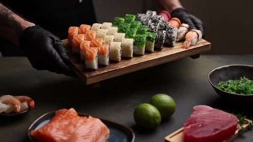 Close-up of delicious Japanese sushi rolls served fresh on a plate in a restaurant.